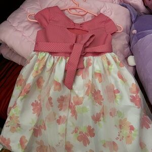 A preloved pink dress, brand is unreadable. Still in good condition